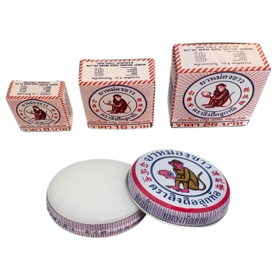 White Monkey Holding Peach Balm